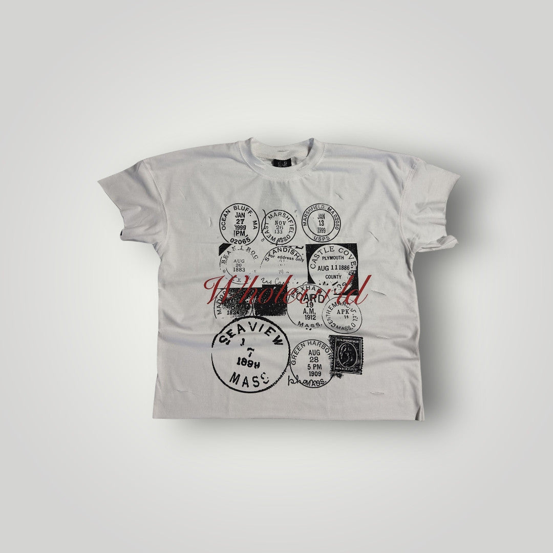 WholeWrldArchives white cotton t-shirt with black vintage Massachusetts postmark stamp graphics and raw-edge sleeves.